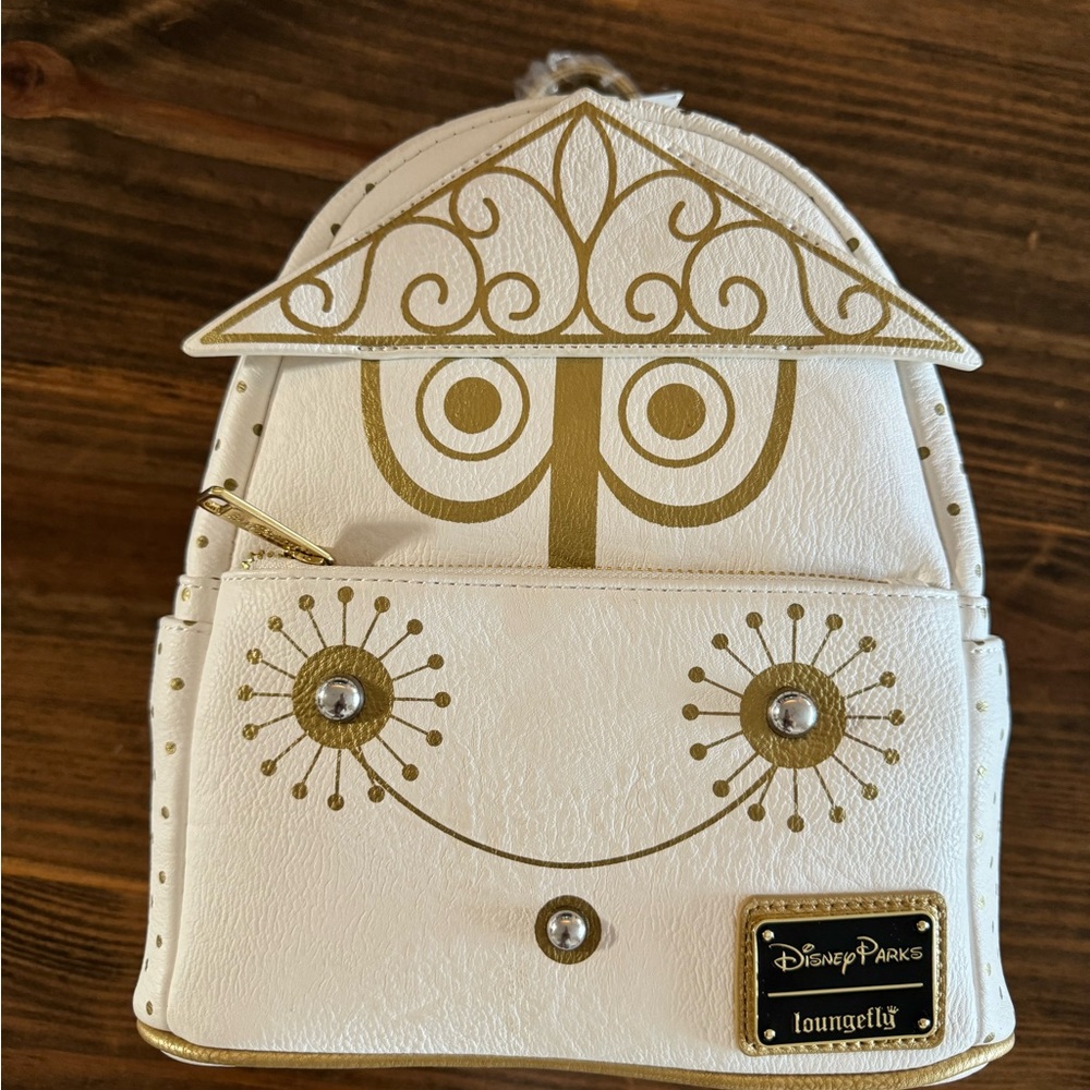 Disney Parks White and Gold Small World Loungefly Mini Backpack